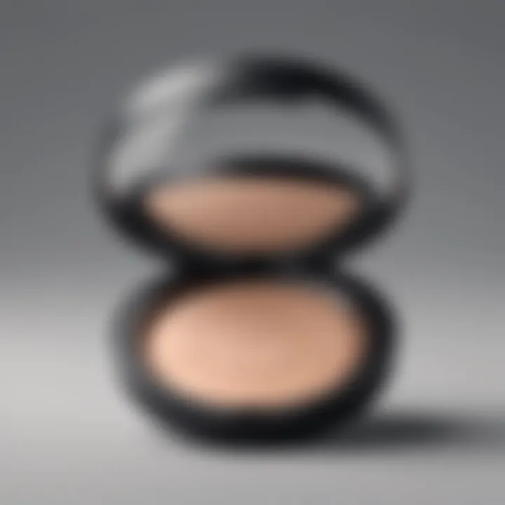 A close-up of a compact powder with a matte black casing